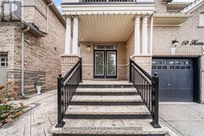 Brampton (Credit Valley) apartment for rent - A house with a front porch and a black gate.