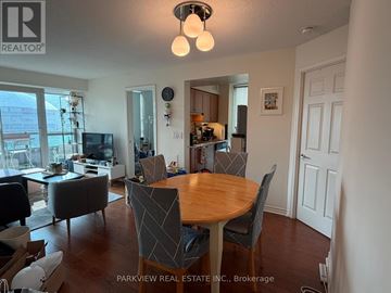 Toronto (Waterfront Communities) condo for rent - A dining room with a table and chairs is shown.
