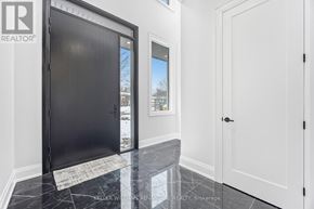 Pickering (West Shore) apartment for rent - A black door is on the left and a white door is on the right.