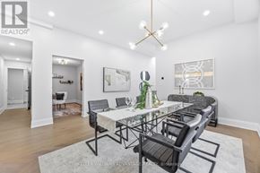 Pickering (West Shore) apartment for rent - A modern dining room with a glass table and chairs.