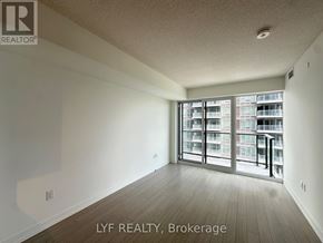 Toronto (Humber Heights) condo for rent - A room with a sliding glass door leading to a balcony.