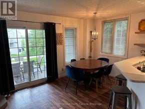 Blue Mountains townhouse for rent - A dining room with a table set for six.
