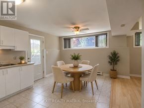 Casselman multi-family for rent - A dining room with a table set for four.