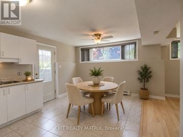 Casselman multi-family for rent - A dining room with a table set for four.