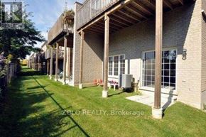 Newmarket (Stonehaven-Wyndham) house for rent - A row of houses with the text ZOLO REALTY Brokerage.