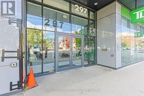 Toronto (Kensington-Chinatown) condo for rent - The entrance to a college with the number 297 on the glass door.