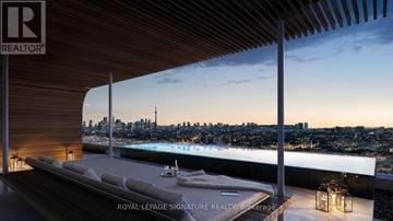 Toronto (Annex) condo for rent - A luxurious outdoor living space with a pool and a view of the city skyline.
