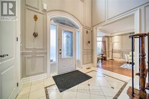 Aurora (Aurora Estates) apartment for rent - A foyer with a white door and a black and white rug.