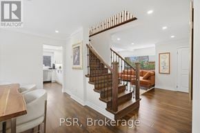 Mississauga (Erin Mills) apartment for rent - A spacious living room with a staircase and a dining table.