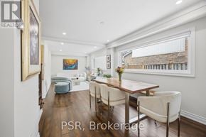 Mississauga (Erin Mills) apartment for rent - A dining room with a wooden table and chairs.