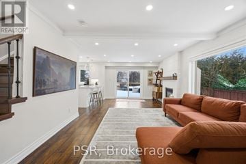 Mississauga (Erin Mills) apartment for rent - A living room with a brown couch and a painting on the wall.