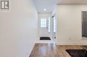 Oakville (Wm Westmount) townhouse for rent - A hallway with a door and a window.