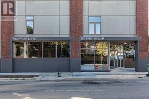 Hamilton (Beasley) condo for rent - A building with the sign 80 King William on it.