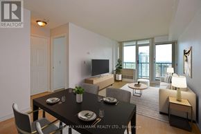 Toronto (Willowdale West) condo for rent - A well-lit, modern dining room with a table set for two and a view of the city.