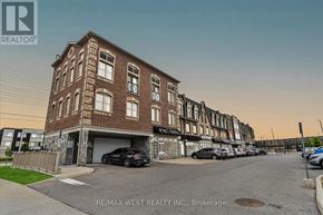 Vaughan (Vellore Village) condo for rent - A building with the text RE/MAX WEST REALTY INC. Brokerage on the bottom right.