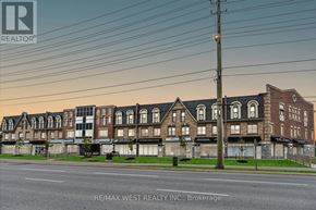 Vaughan (Vellore Village) condo for rent - A street view of a row of buildings with a sign that reads RE/MAX West Realty Inc., Brokerage.