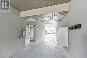 Vaughan (Vellore Village) condo for rent - A hallway with a white door and a white wall.