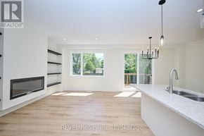 Niagara Falls (Ascot) apartment for rent - A modern kitchen with a large window and wooden flooring.