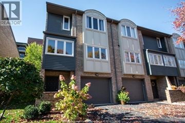 Windsor townhouse for rent - A row of townhouses with a clear blue sky above them.