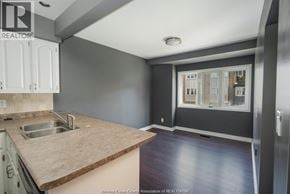Windsor townhouse for rent - A kitchen with a sink and a window.