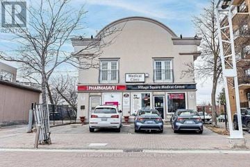 Mississauga (Streetsville) apartment for rent - A medical clinic with a pharmacy is located in a commercial area.
