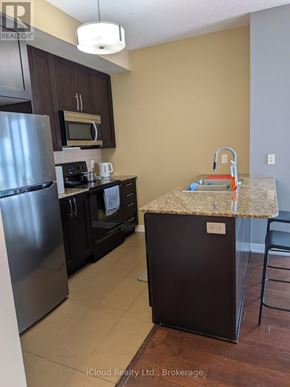 Mississauga (Creditview) condo for rent - A room with a desk, chair, and shelves.