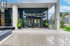 Toronto (Mimico) condo for rent - The entrance to a building with the number 388 and the name Anne Crawford on it.