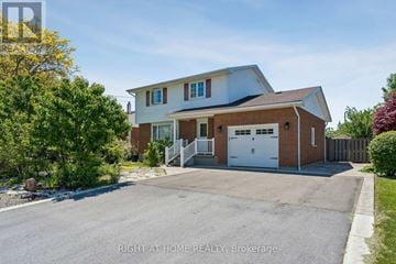 Fort Erie (Lakeshore) apartment for rent - A two-story house with a garage is for sale.
