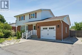 Fort Erie (Lakeshore) apartment for rent - A two-story house with a garage is for sale.