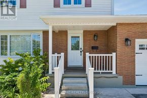 Fort Erie (Lakeshore) apartment for rent - A house with a white door and a small porch.