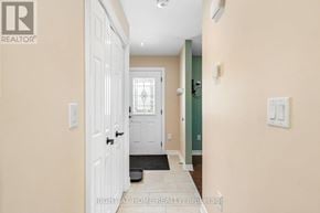 Fort Erie (Lakeshore) apartment for rent - A hallway with a white door and a window.