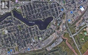 Moncton apartment for rent - A satellite image of a city area with a lake, a McDonald's and a Tim Hortons.