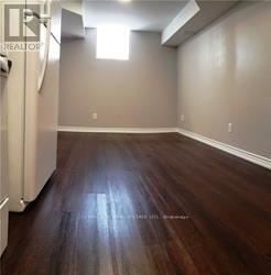 Oakville (Wt West Oak Trails) apartment for rent - A room with wooden flooring and a window.