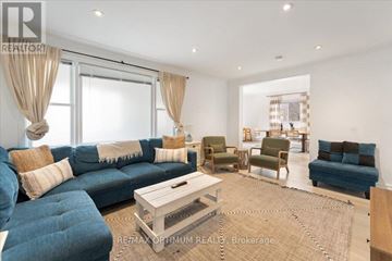 Hamilton (Hamilton Beach) apartment for rent - A living room with a blue couch and a coffee table.