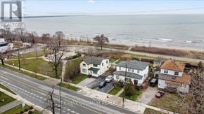 Hamilton (Hamilton Beach) apartment for rent - A bird's eye view of a residential area with houses and a road.