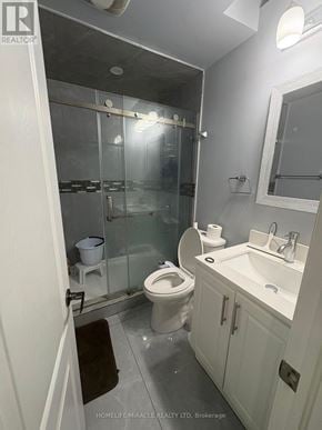 Brampton (Northwest Brampton) apartment for rent - A white bathroom with a toilet, sink, and shower.
