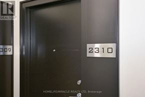 Toronto (Niagara) condo for rent - A black door with the number 2310 on it.