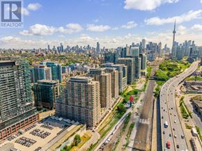 Toronto (Niagara) condo for rent - A cityscape with a highway running through it.