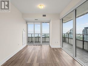 Toronto (Mimico) condo for rent - A room with a sliding glass door leading to a balcony.