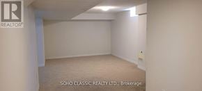 Georgina (Keswick North) apartment for rent - A white room with a brokerage sign on the wall.