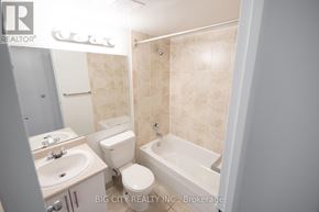 Toronto (Playter Estates-Danforth) condo for rent - A bathroom with a toilet, sink, and bathtub.