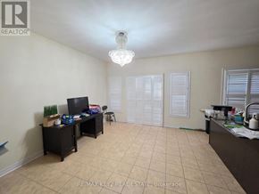 Pickering (Duffin Heights) apartment for rent - A room with a desk and a computer on it.