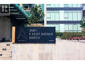 Vancouver apartment for rent - A black sign with white lettering reads "3581 E Kent Avenue North" in front of a building.
