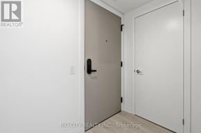 Toronto (Thorncliffe Park) condo for rent - A white door with a black handle is in a room with white walls.