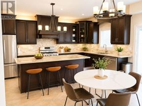 Oakville (Jc Joshua Creek) apartment for rent - A kitchen with a white table and chairs.