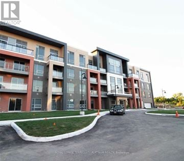 Burlington (Tansley) house for rent - A building with a car parked in front of it.
