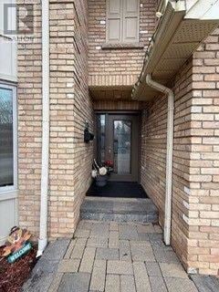 Burlington (Headon) apartment for rent - A brick building with a doorway and a window.