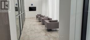 Mississauga (City Centre) condo for rent - A waiting area with chairs and a flat screen TV.