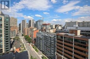 Ottawa house for rent - A cityscape with a clear blue sky and buildings of various heights.