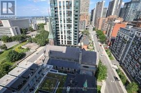 Ottawa house for rent - A cityscape with a mix of modern and older buildings, with the text "ROYAL LEPAGE PERFORMANCE REALTY Brokerage" overlaid on the image.